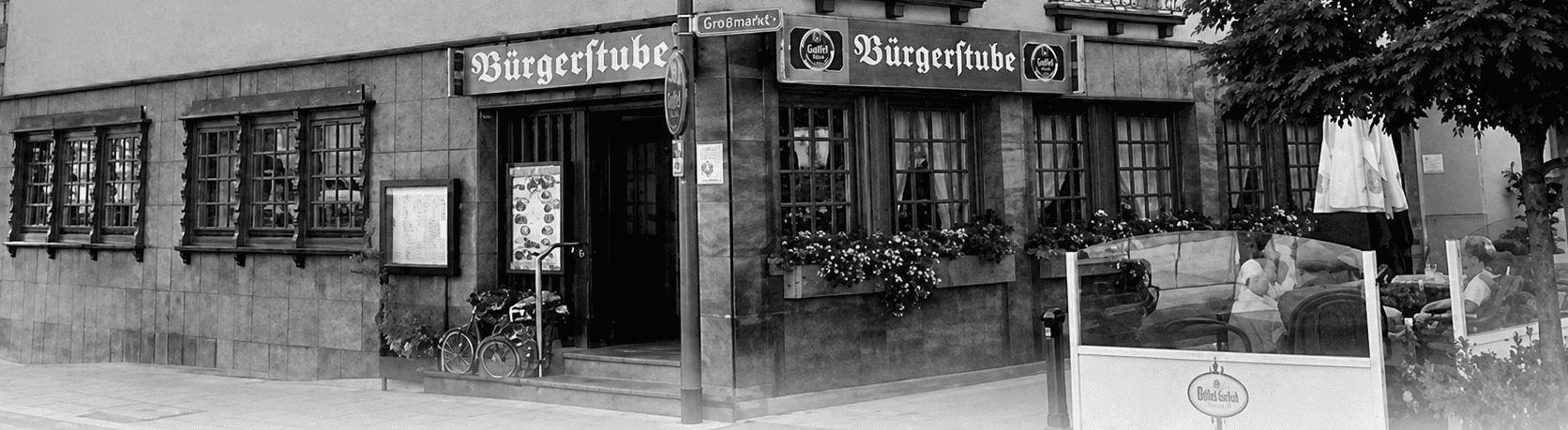 Black and white exterior view of Hotel & Restaurant Bürgerstube