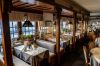 Gemütlicher Gastraum des Restaurants Bürgerstube in Velbert mit gedeckten Tischen